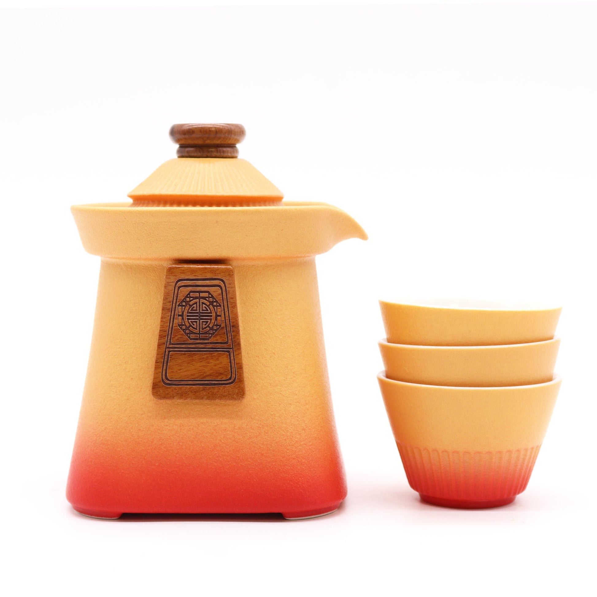 Rustic orange earth ceramic teapot with three matching teacups featuring a traditional temple-inspired design.
