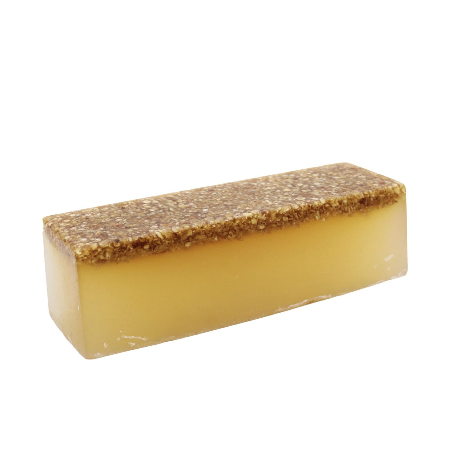 Hand-crafted honey and oatmeal soap loaf with a textured layer of natural oats on top.