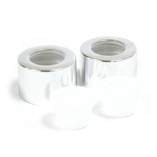 Sleek silver circular reed diffuser bottle cap with a matching travel plug and cork seal.