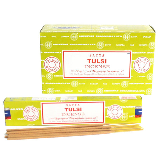 Hand rolled incense sticks in a blue box with green tulsi holy basil leaf design.