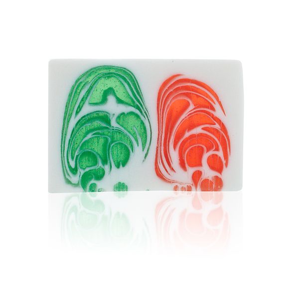 A vibrant purple handcrafted soap slice with a textured top, showing a rich grape-inspired colour.