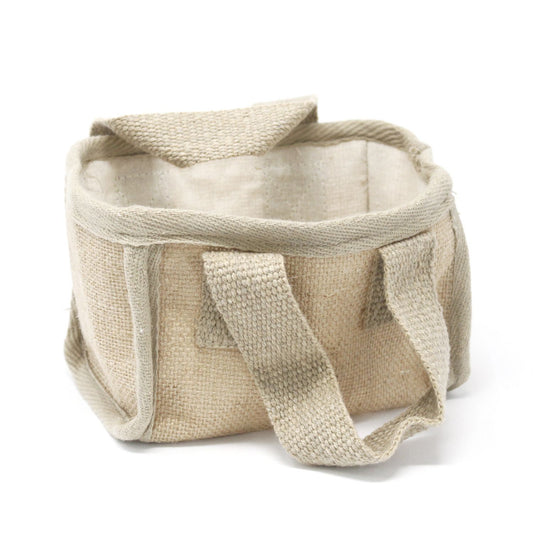 Small rectangular natural jute and cotton basket with soft handles and a cream cotton lining.
