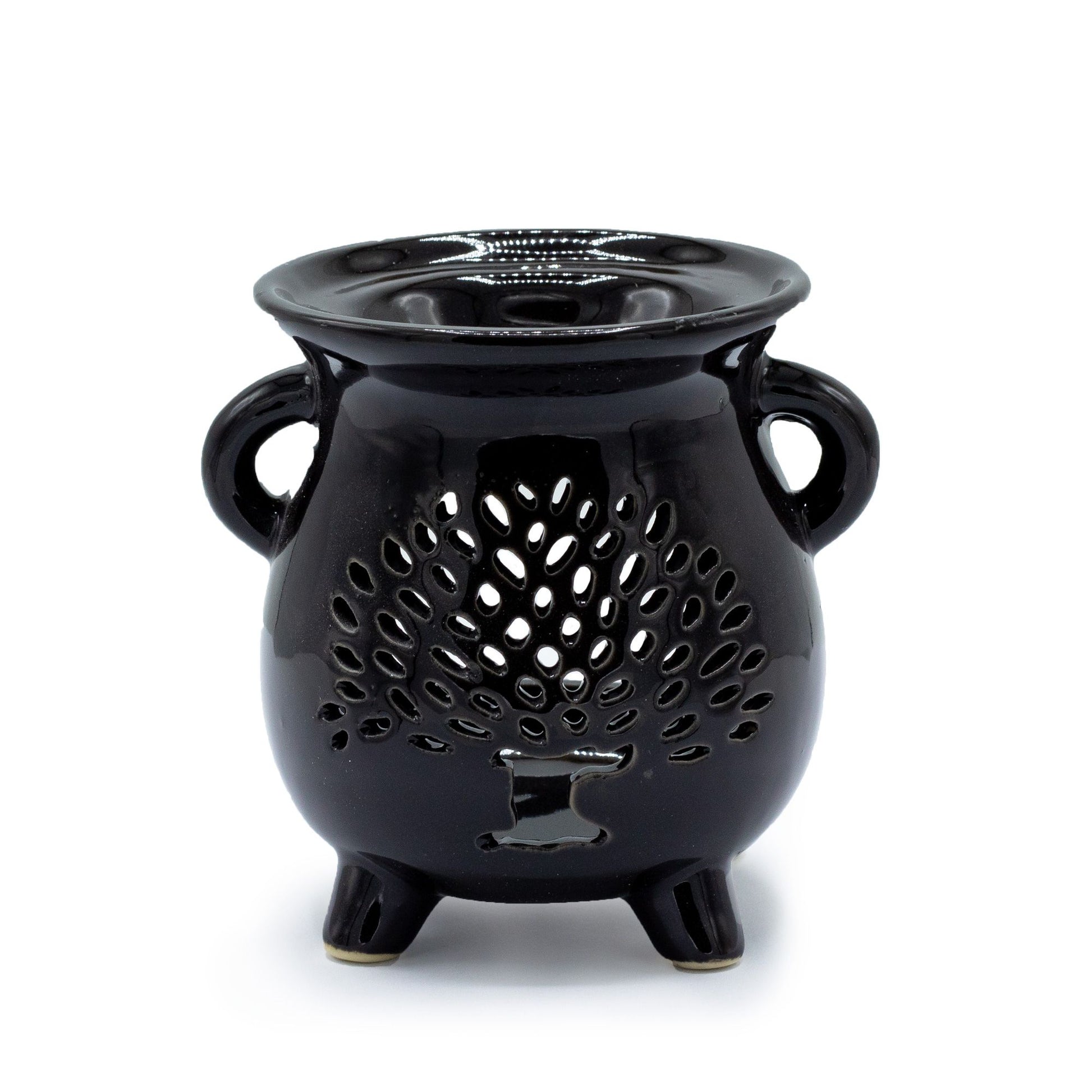 Black ceramic cauldron-shaped oil burner featuring a cut-out Tree of Life design on the front.