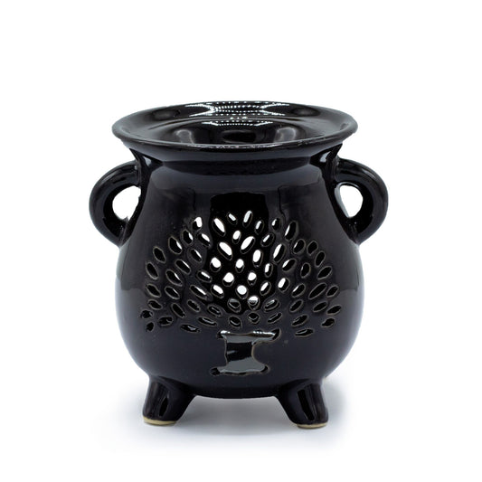Black ceramic cauldron-shaped oil burner featuring a cut-out Tree of Life design on the front.