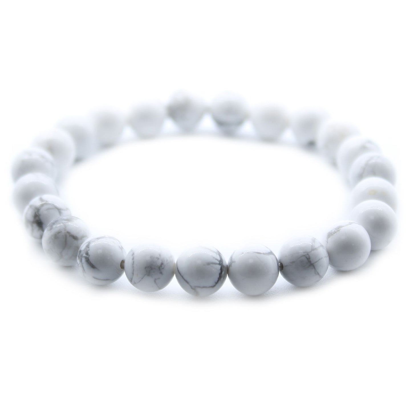 Elegant elasticated power bracelet featuring smooth, round white jasper gemstone beads with natural grey marbling.