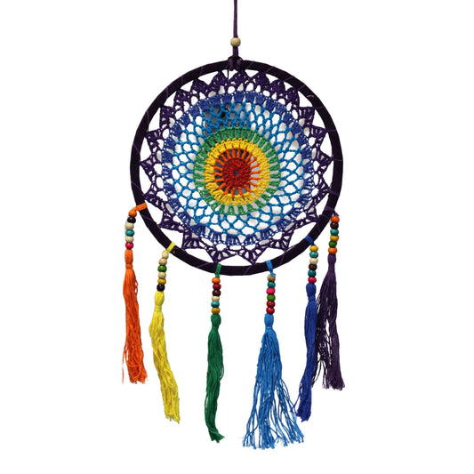 Small colourful rainbow dreamcatcher with vibrant multi-coloured netting and hanging feathers.