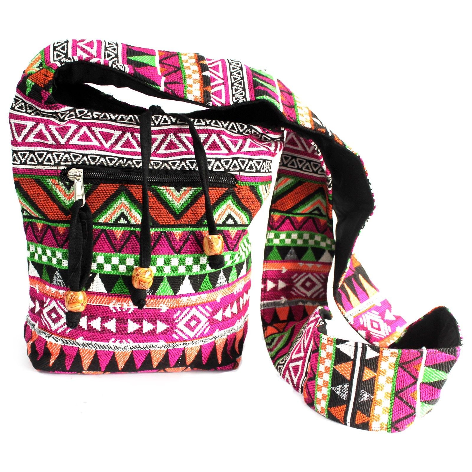 Pink ethnic jacquard fabric sling bag with a casual cross-body strap and intricate woven patterns.