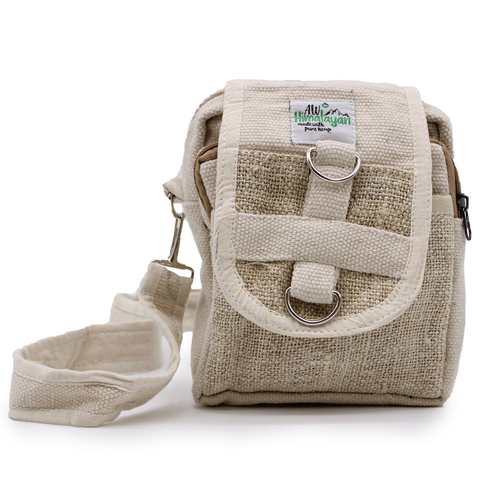 Sustainable tan cross-body travel bag made from a textured natural hemp and cotton blend with an adjustable strap.