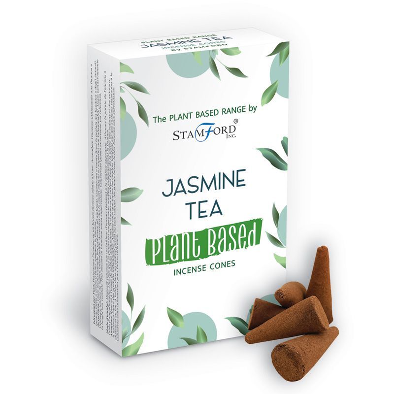 Handcrafted jasmine tea scented incense cones arranged on a stone burner against a soft background.