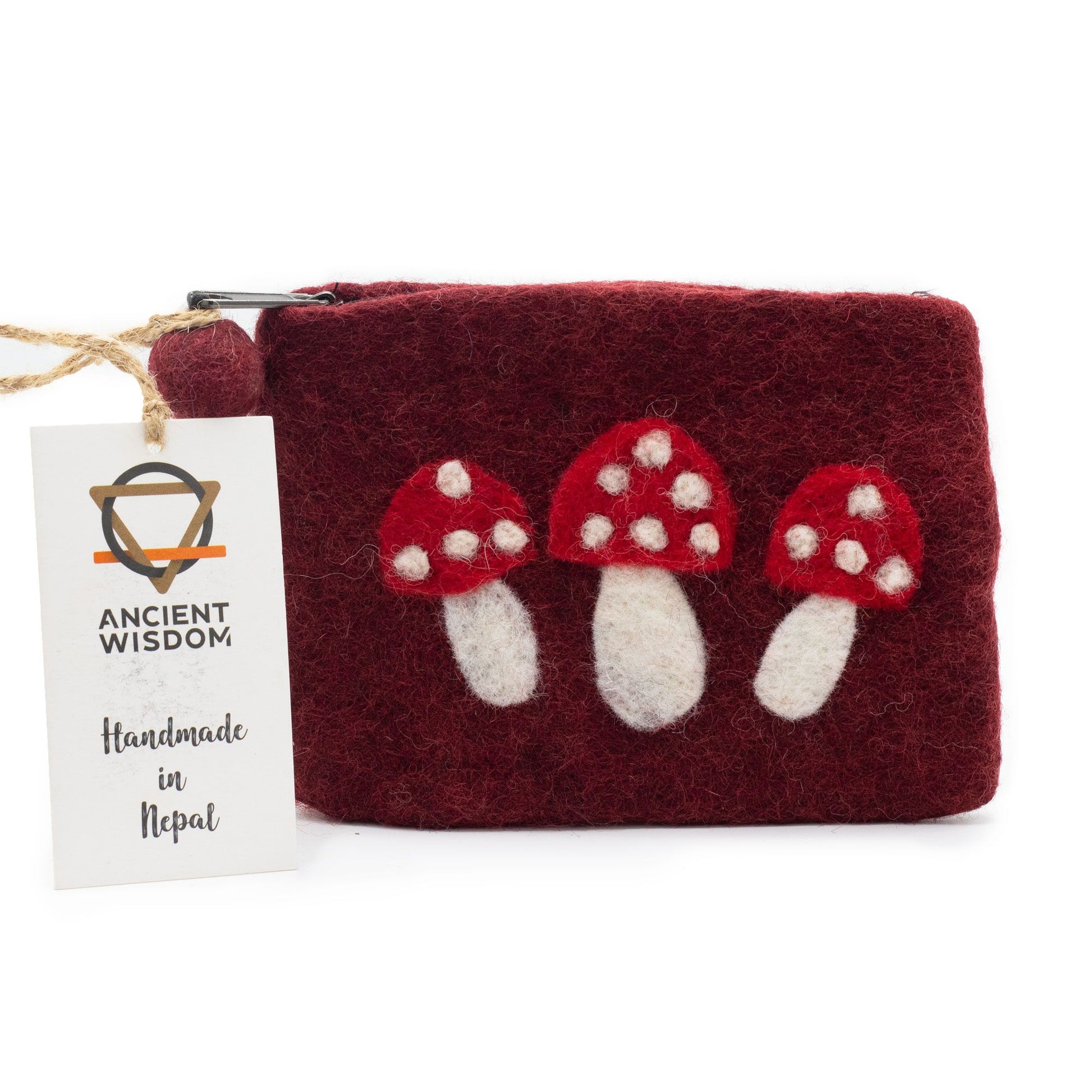 Handcrafted natural grey felt pouch featuring colorful embroidered wild mushrooms and a secure top zipper.