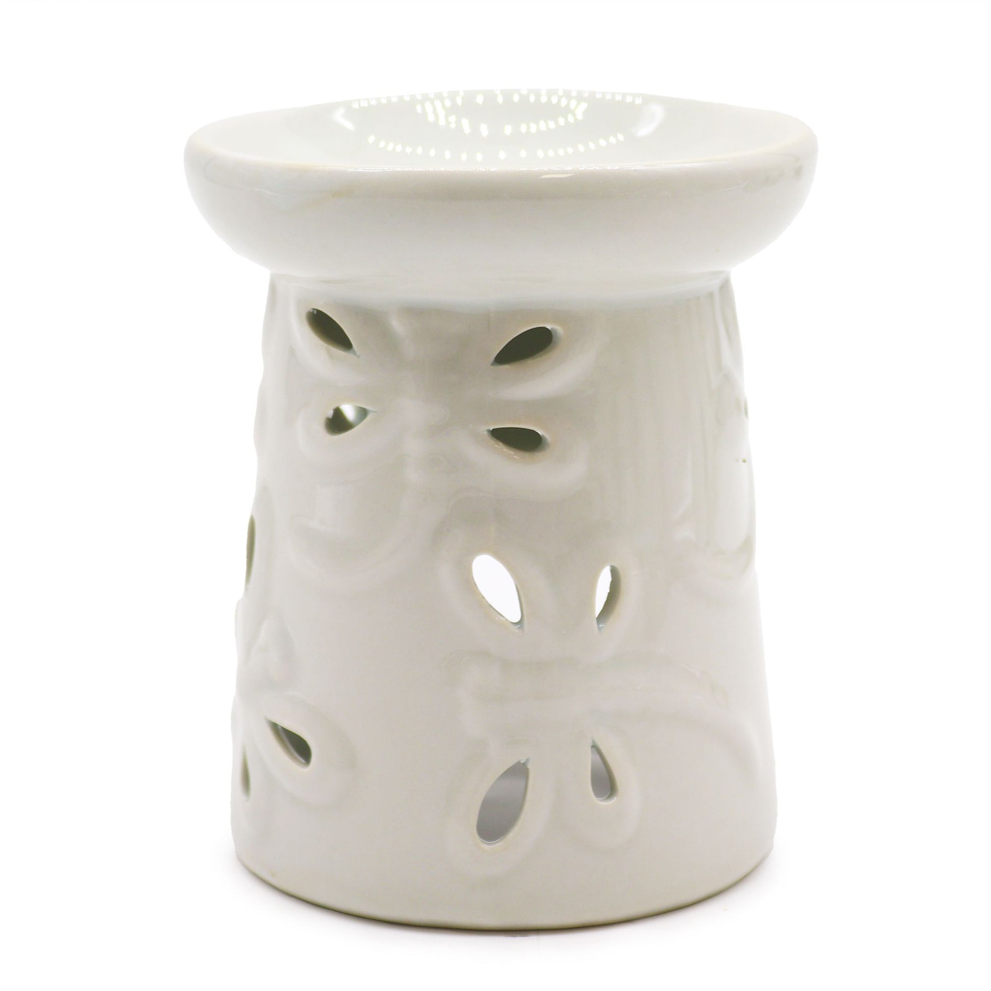 Elegant white ceramic oil burner featuring a decorative carved dragonfly design on the front.