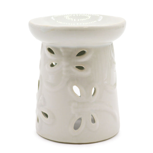 Elegant white ceramic oil burner featuring a decorative carved dragonfly design on the front.