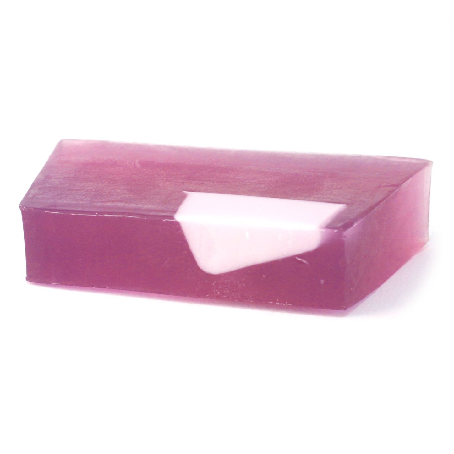 Handcrafted rectangular soap bar with a natural texture, featuring sweet fennel and jojoba oil ingredients.