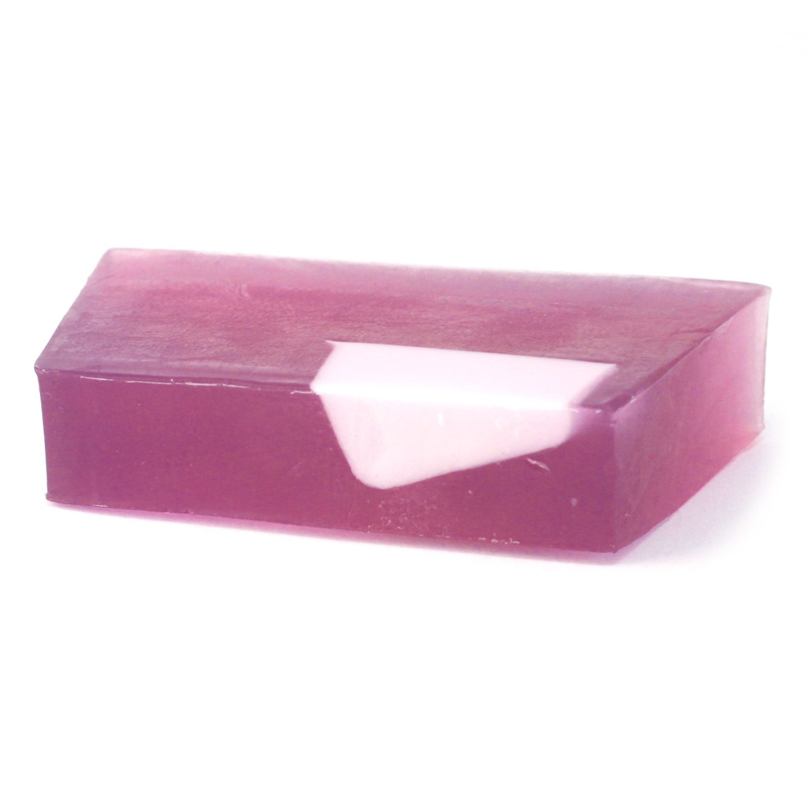 Handcrafted rectangular soap bar with a natural texture, featuring sweet fennel and jojoba oil ingredients.