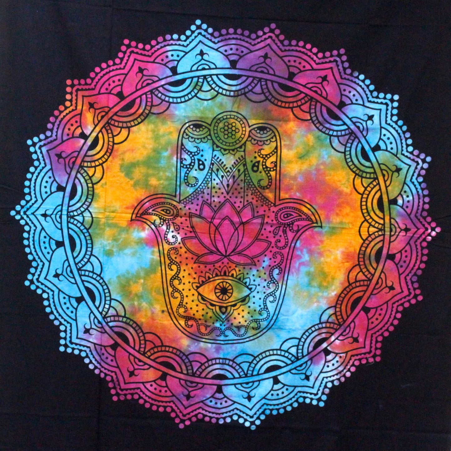Handmade single cotton bedspread and wall hanging featuring a large black Hamsa Hand design on a neutral background.