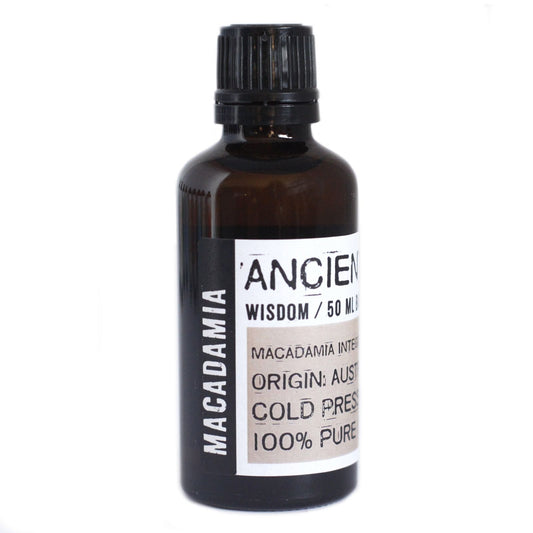 50ml amber glass bottle of macadamia base oil with a black screw cap on a plain white background.