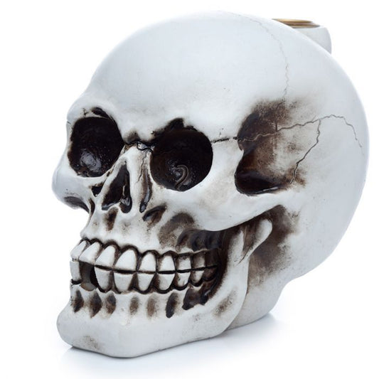 Detailed gothic skull incense burner featuring a dramatic downward cascading smoke effect from a backflow cone.