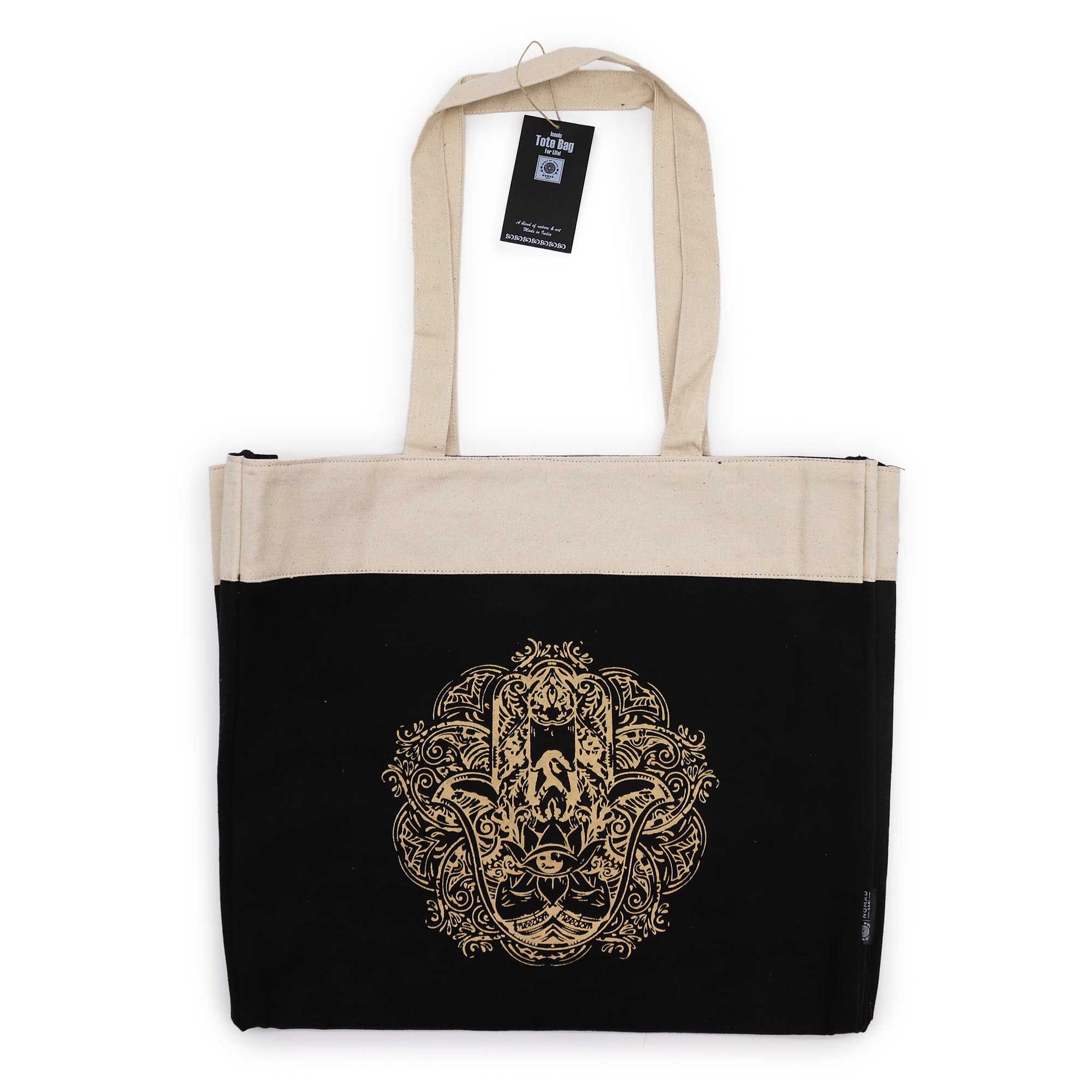 Oversized chocolate brown stonewash cotton tote bag featuring a large white Hamsa hand design on the front.