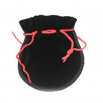 Luxurious small black velvet pouch with a gothic aesthetic and drawstring closure.