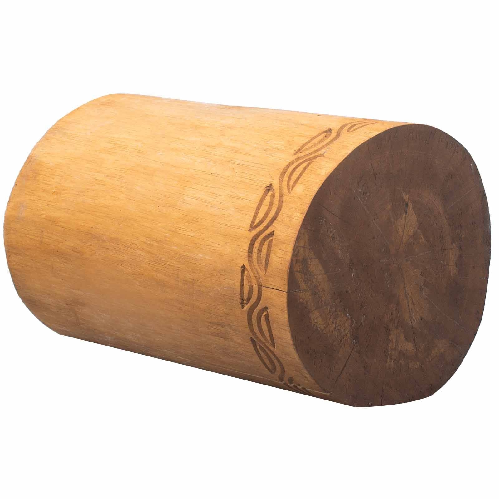 Hand-carved cylindrical Albasia wood stool and table with a natural finish and intricate tribal patterns.