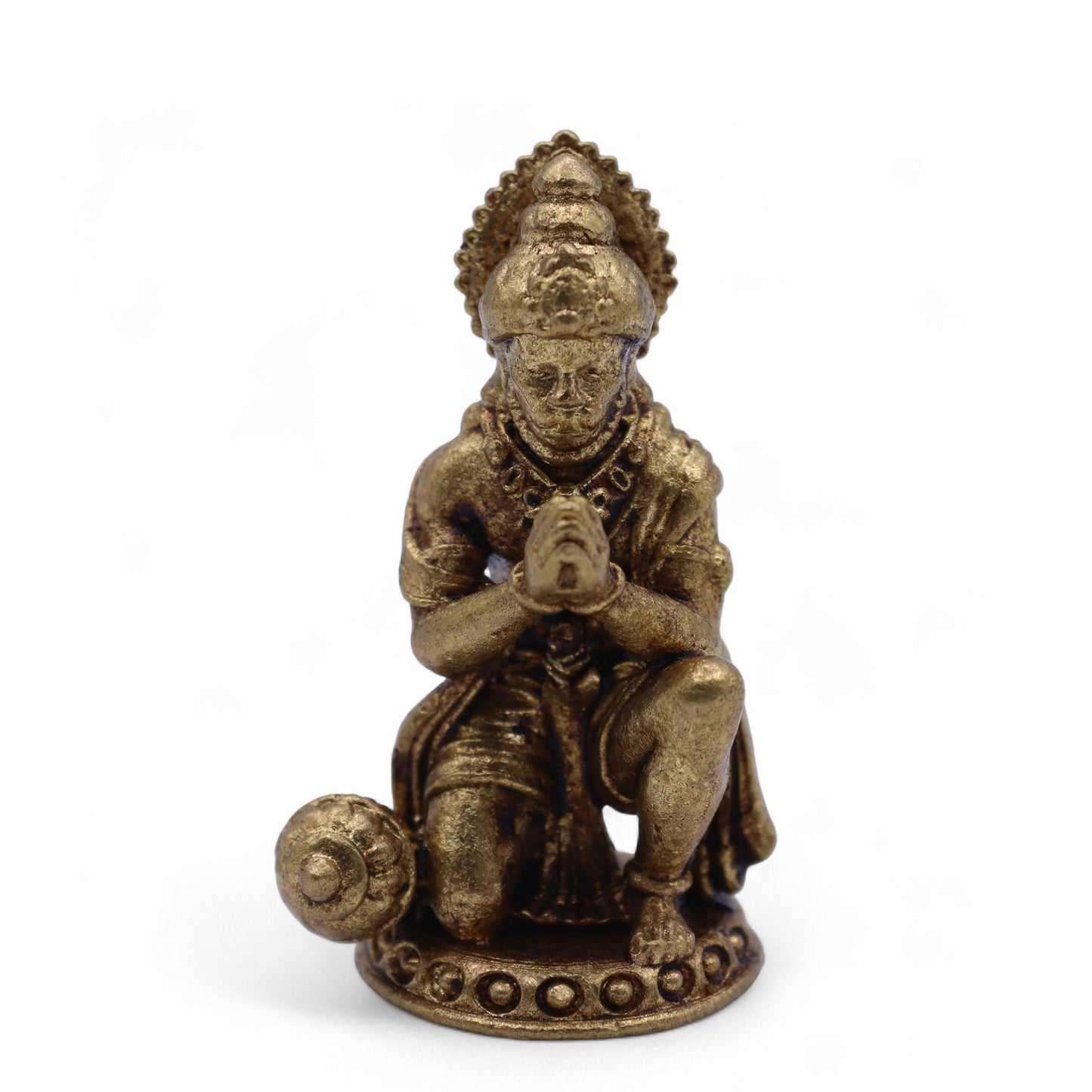 Small detailed brass figurine of the Hindu deity Hanuman in a prayer pose, handcrafted for spiritual decor.