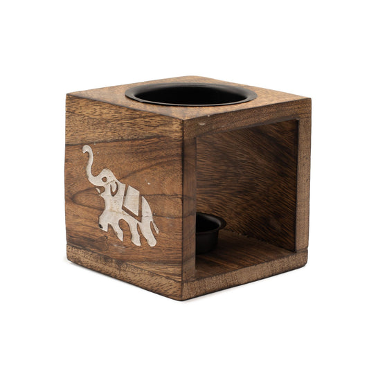 Square hand-carved mango wood oil burner with a detailed elephant engraving and a ceramic bowl on top for essential oils.