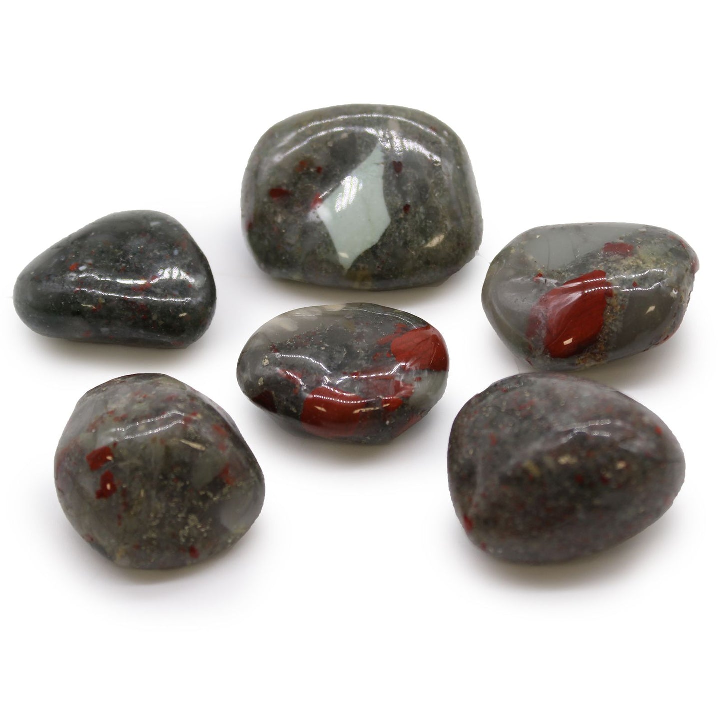 Large polished green African Bloodstone tumble stones with deep red jasper inclusions and a smooth finish.