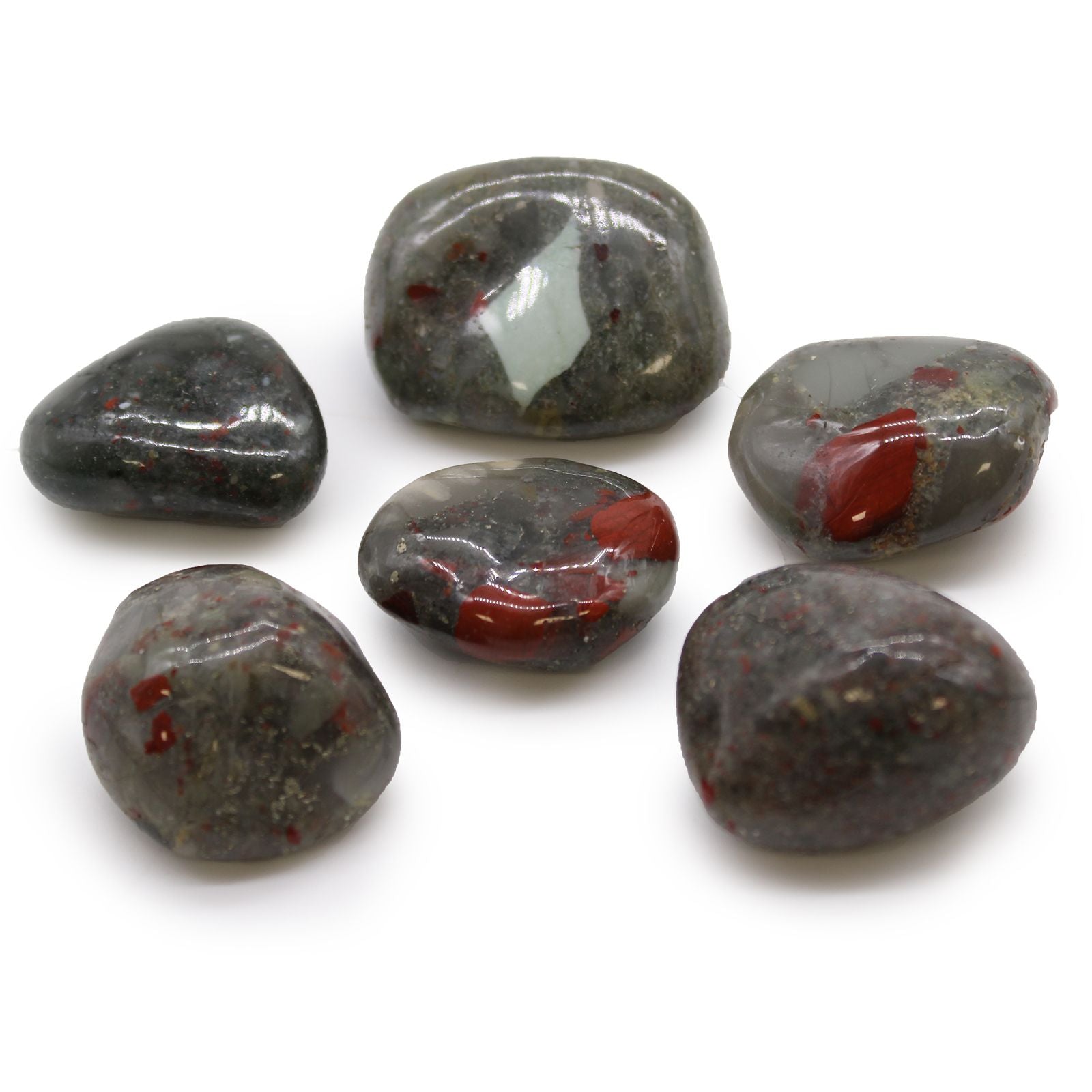 Large polished green African Bloodstone tumble stones with deep red jasper inclusions and a smooth finish.