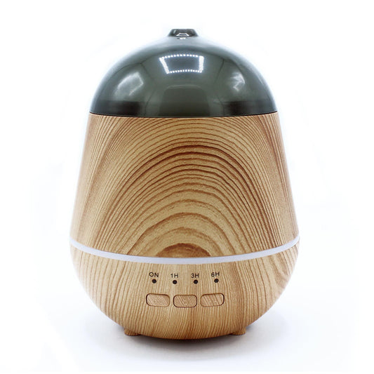 Elegant white ultrasonic aroma diffuser with a minimalist cylindrical design and soft glowing light ring.