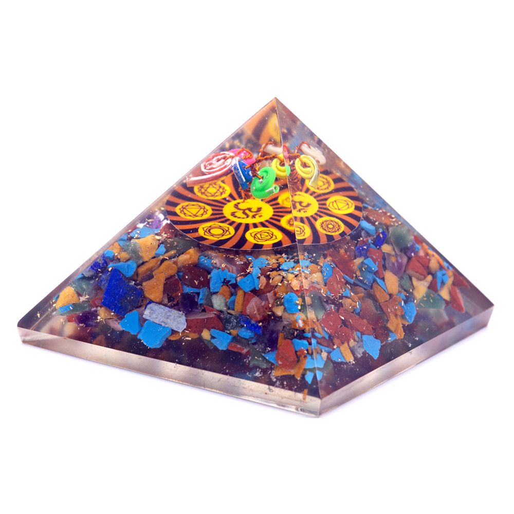 Handcrafted orgonite pyramid with seven chakra crystal layers and a gold-tone Om symbol at the centre.