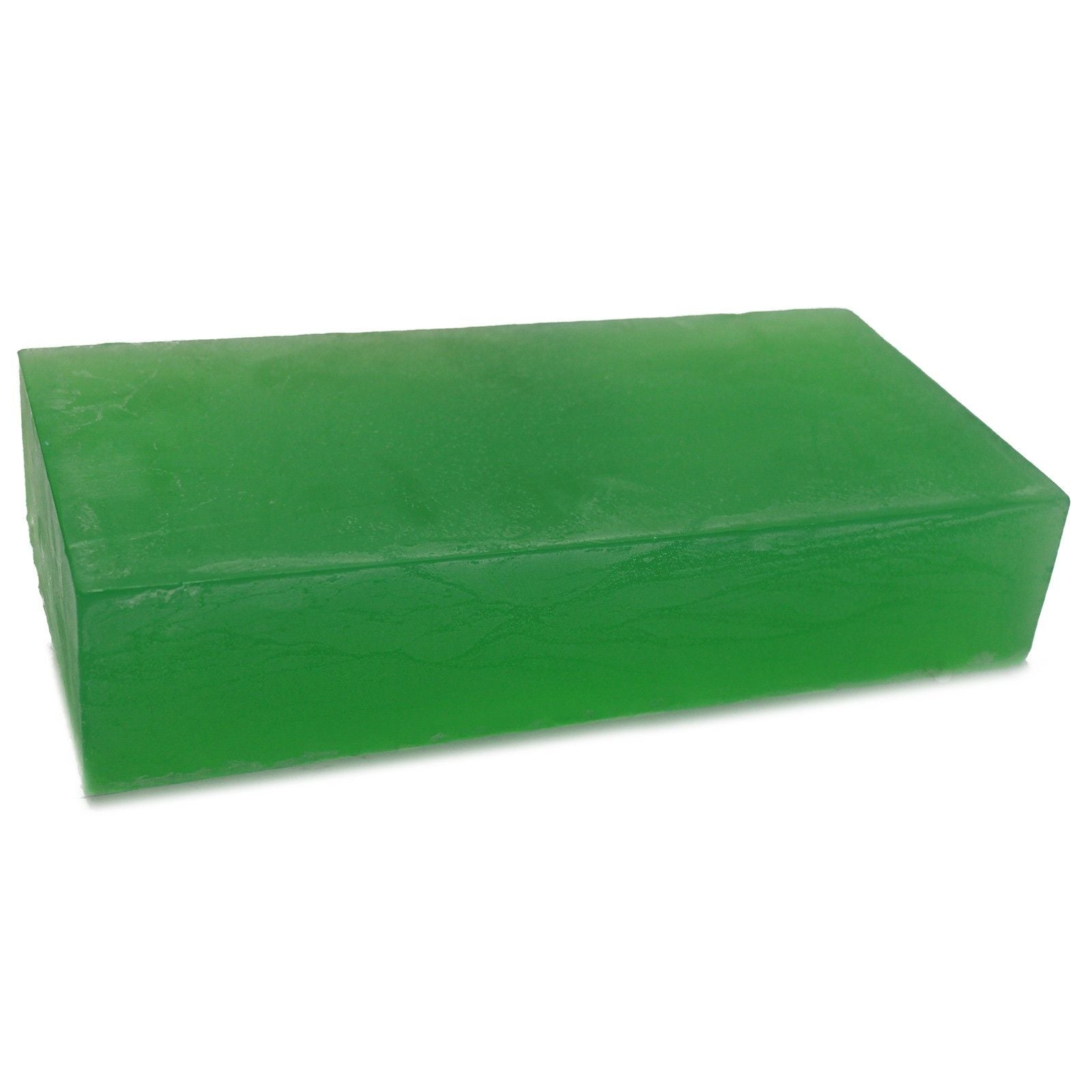 Large artisanal soap loaf infused with tea tree essential oil, showing a textured natural green and cream surface.
