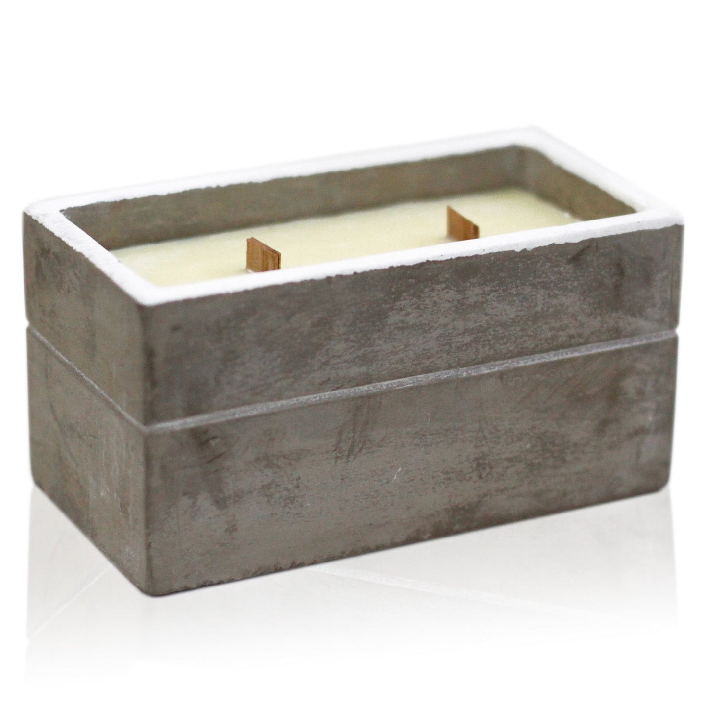 Large rectangular grey concrete candle with a natural wooden wick and spiced lime scented wax.