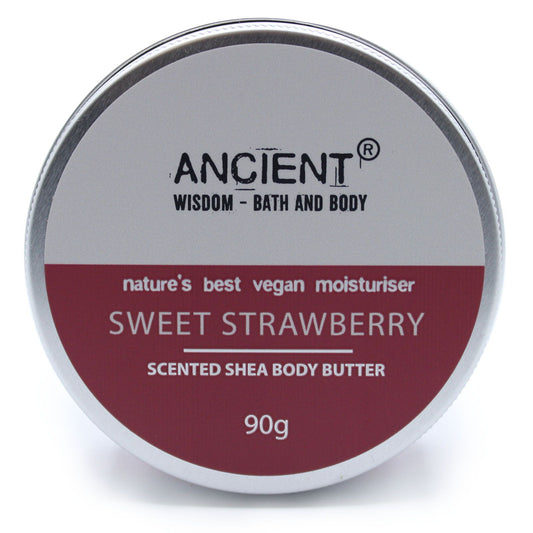 Smooth, creamy pink strawberry scented shea body butter in a clear circular pot.
