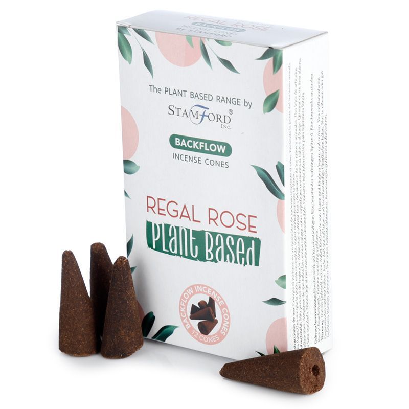 Deep red backflow incense cones arranged neatly on a surface, highlighting their unique conical shape and texture.