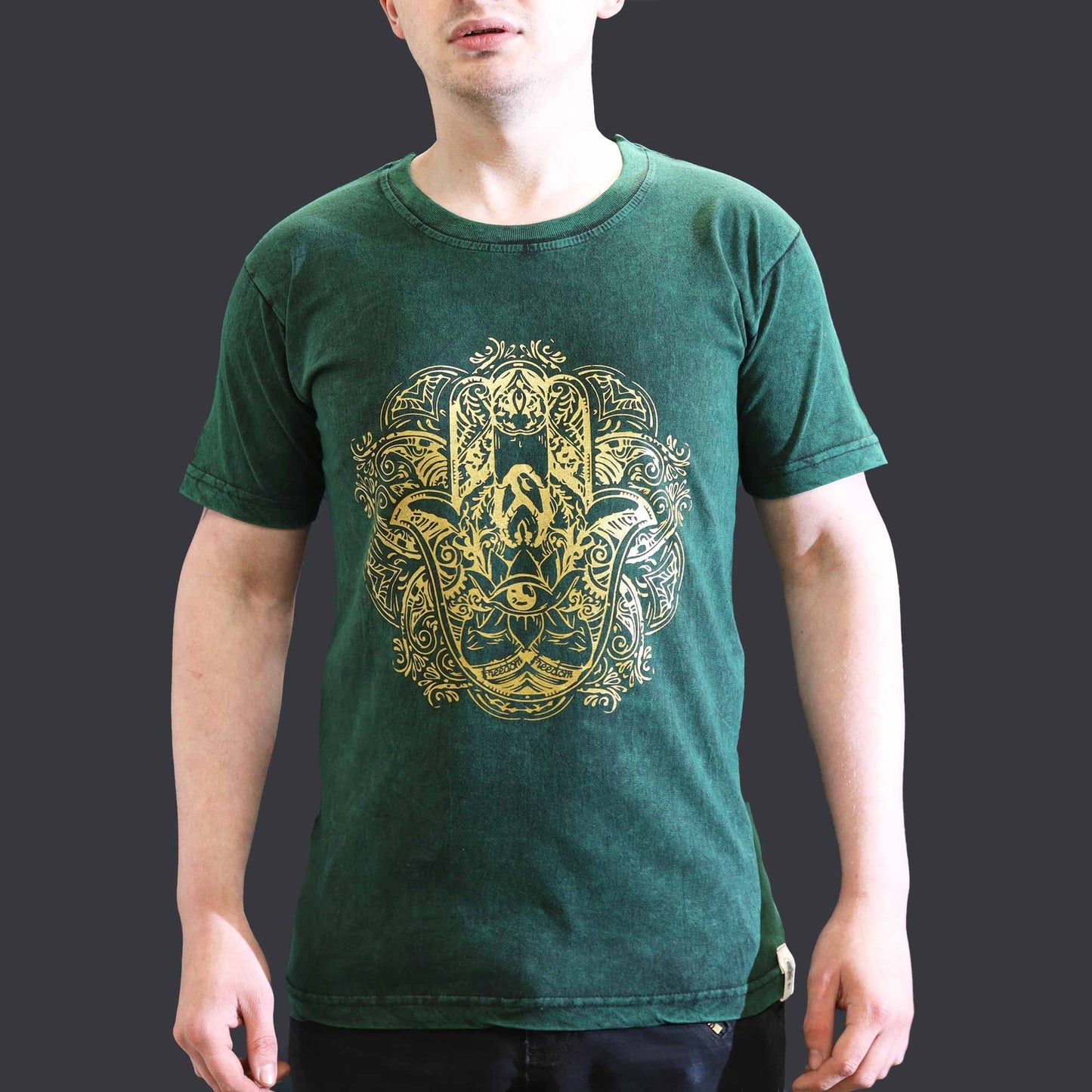 Green stonewashed t-shirt featuring a central Hamsa symbol design in a relaxed fit.