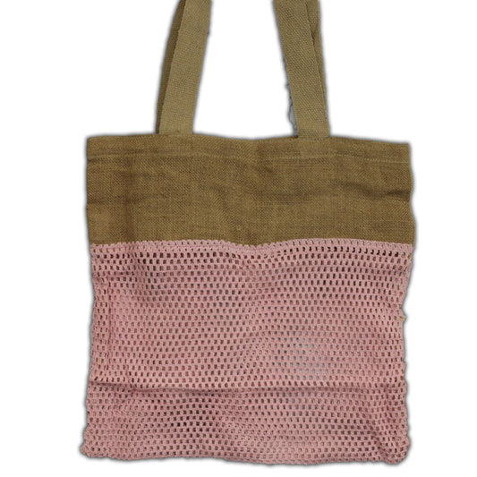 Sustainable rose pink mesh bag made from soft jute and cotton fibers with a woven handle.
