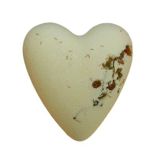 Two heart-shaped bath fizzers with a soft yellow and white texture, infused with chamomile and honey scents.