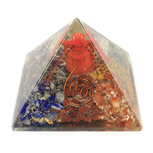 Large 70mm orgonite pyramid featuring a gold-tone Ganesh figure and embedded crystals for spiritual protection.