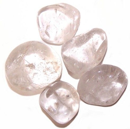 A collection of high-quality, clear and polished large Rock Crystal tumbled stones showing natural light reflections.