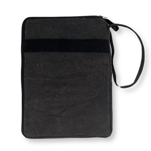 Slim charcoal grey stonewash fabric laptop and tablet pouch with a minimalist travel-friendly design.