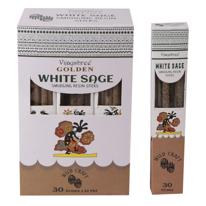 Several handcrafted golden white sage smudging resin sticks bundled together on a neutral background.