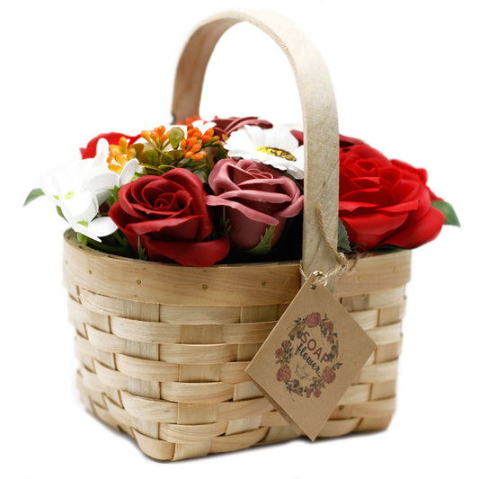 Large red soap flower bouquet with roses, hyacinths and a sunflower presented in a charming rustic wicker basket.