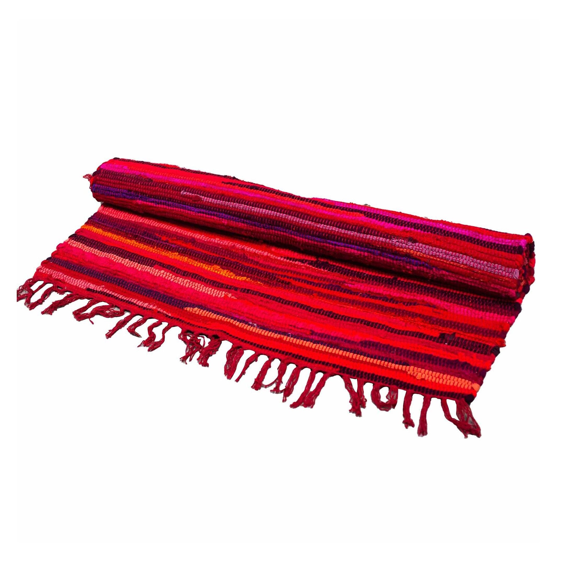Large hand-woven rag rug in vibrant shades of shocking pink with a textured, durable finish.