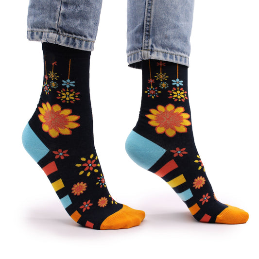 Soft bamboo socks featuring a vibrant colourful mandala flower pattern on a neutral background.