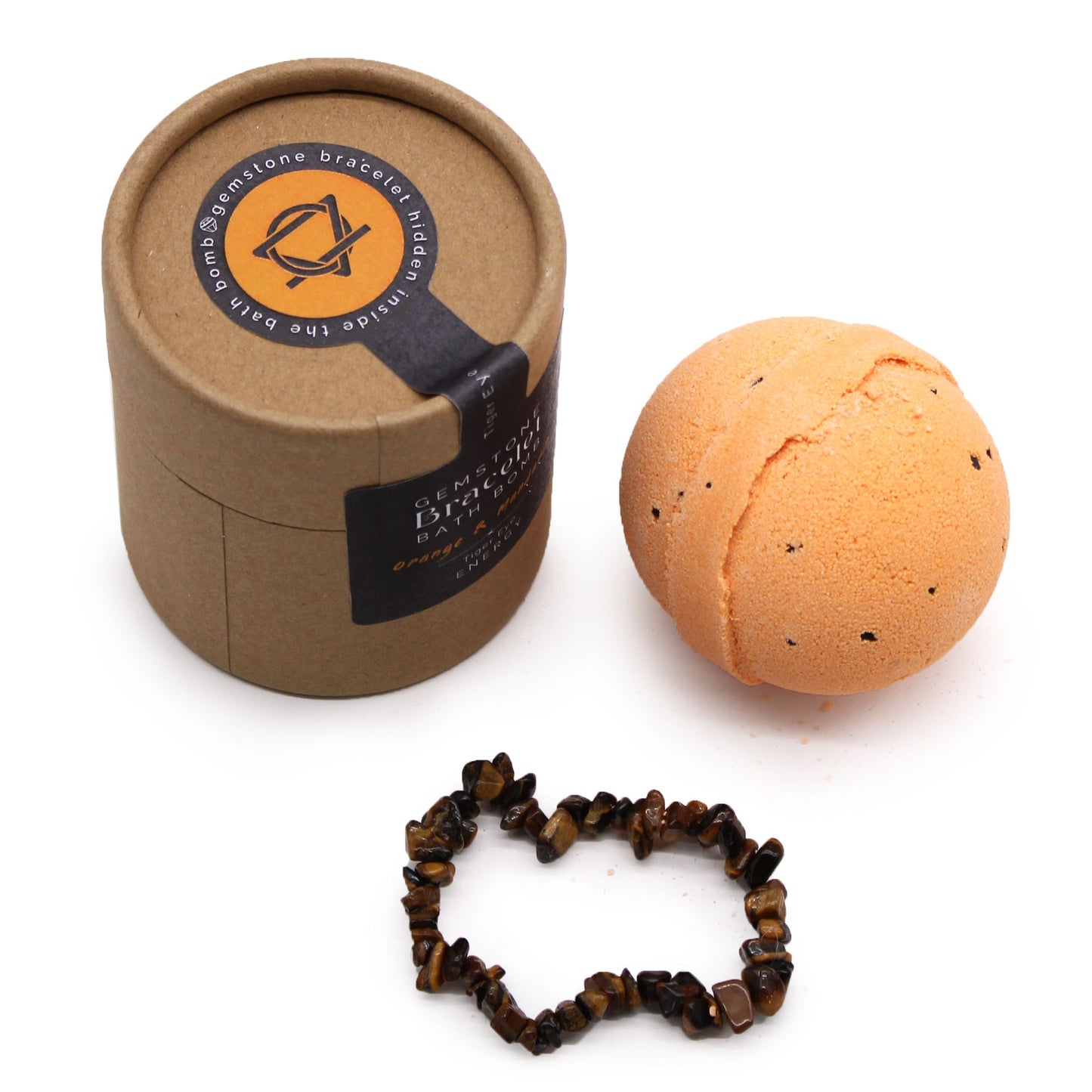 Artisanal round bath bomb with orange speckles next to a polished Tiger Eye gemstone beaded bracelet.
