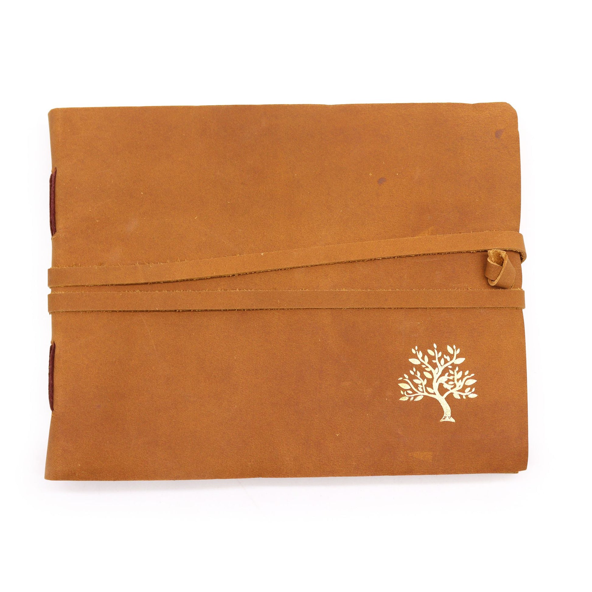 Handcrafted brown leather sketchbook featuring an embossed golden tree design with a wrap-around cord closure.