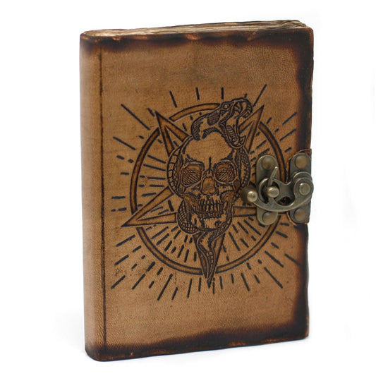 Handcrafted vintage leather notebook featuring an embossed pentagon and skull design with metal clasps and burnt edges.