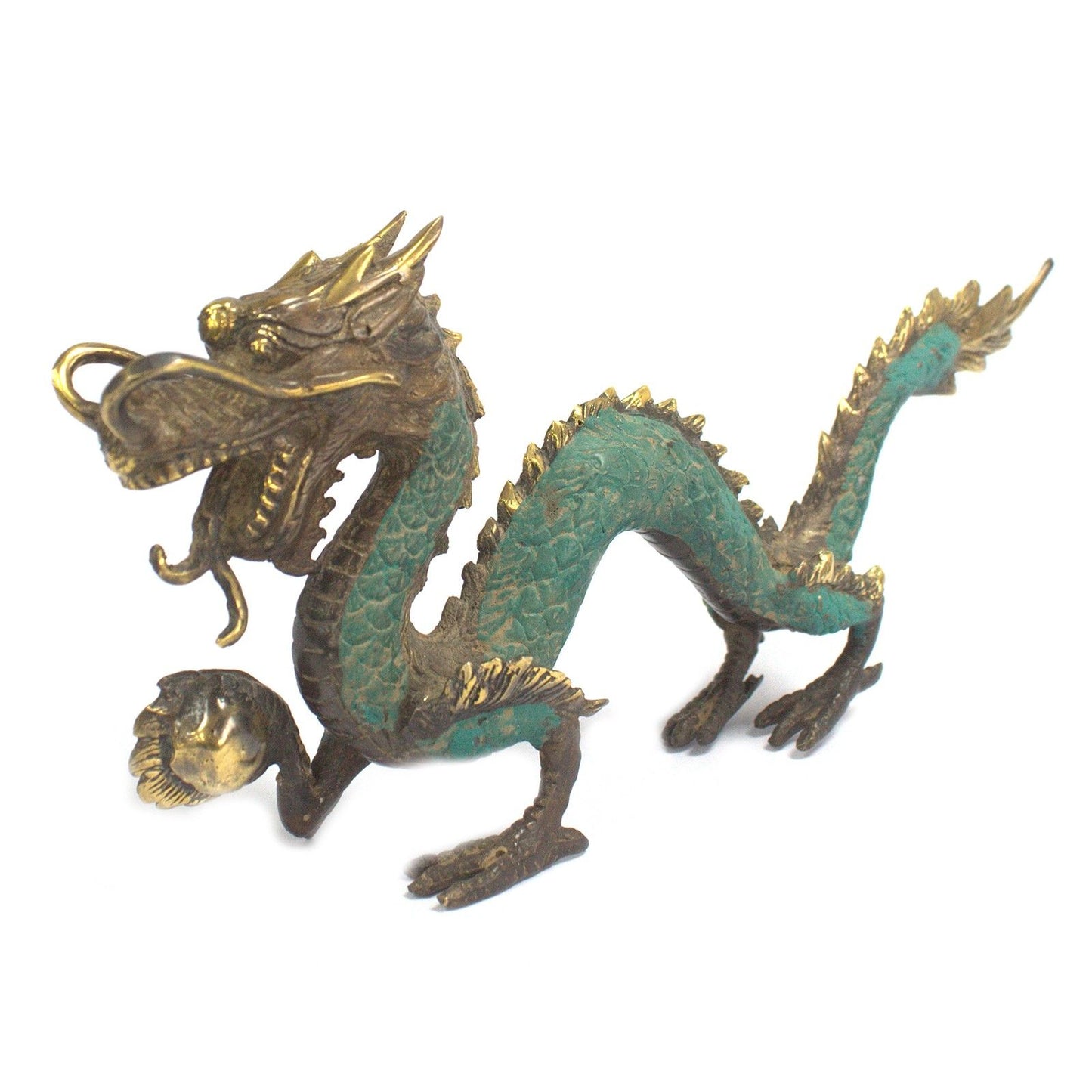 Intricate brass dragon ornament holding a pearl ball, standing on an ornate base with traditional Eastern design details.