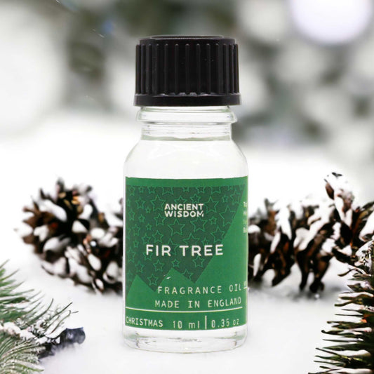 A small amber glass bottle of fir tree fragrance oil with a black dropper cap.