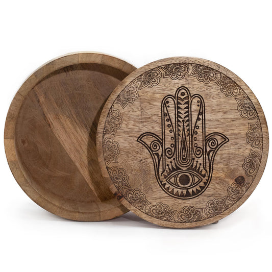 Large round black wooden storage box featuring an intricate white engraved Hamsa hand design on the lid.